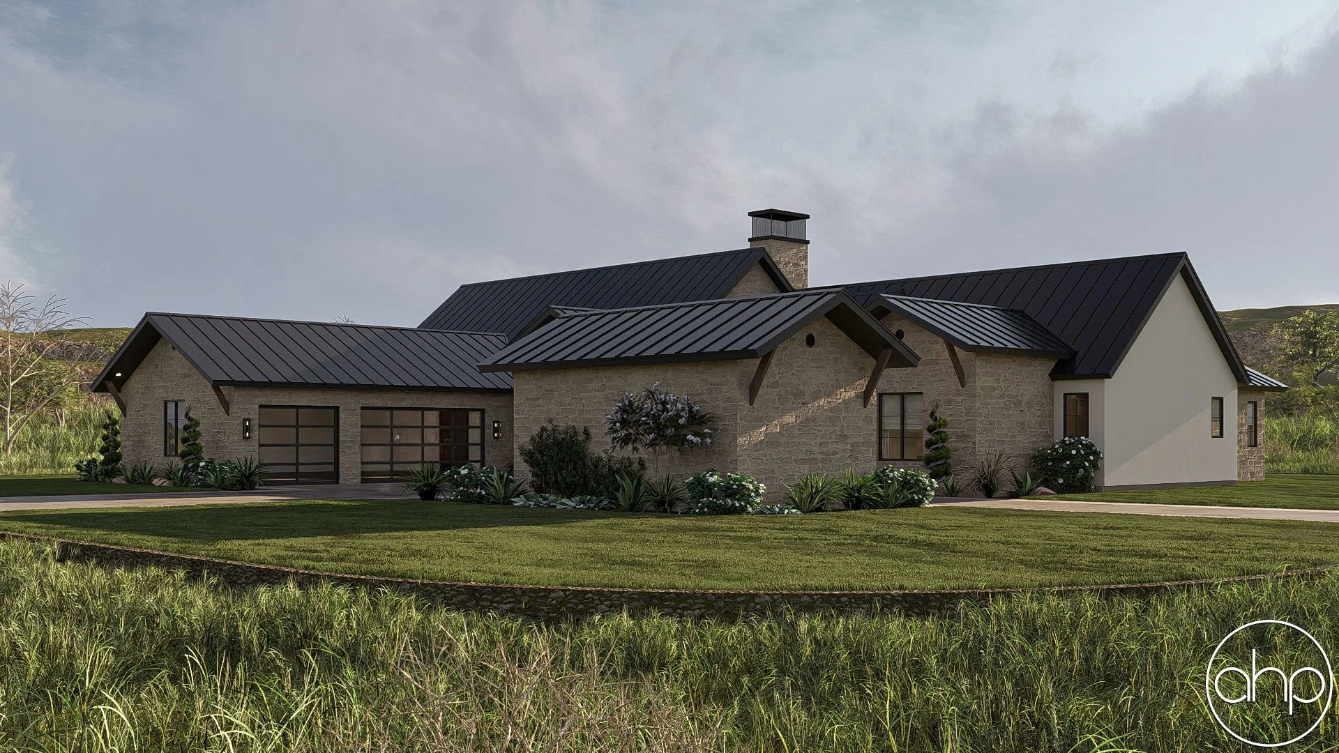 A modern house with stone and white walls, black metal roof, large windows, and a landscaped front yard with grass, bushes, and small trees, set against a natural background with sky and greenery.