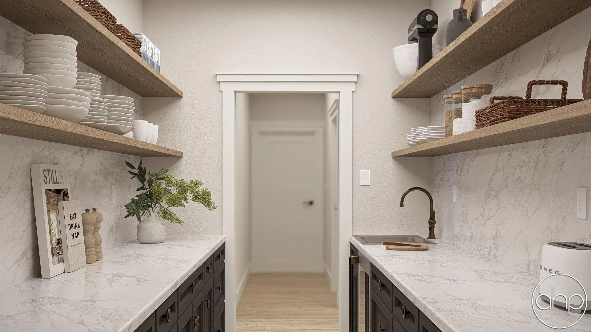 A modern kitchen pantry with open shelves holding plates, bowls, baskets, and jars, marble countertops, a small sink, and decorative items. Doorway leads to a hallway.