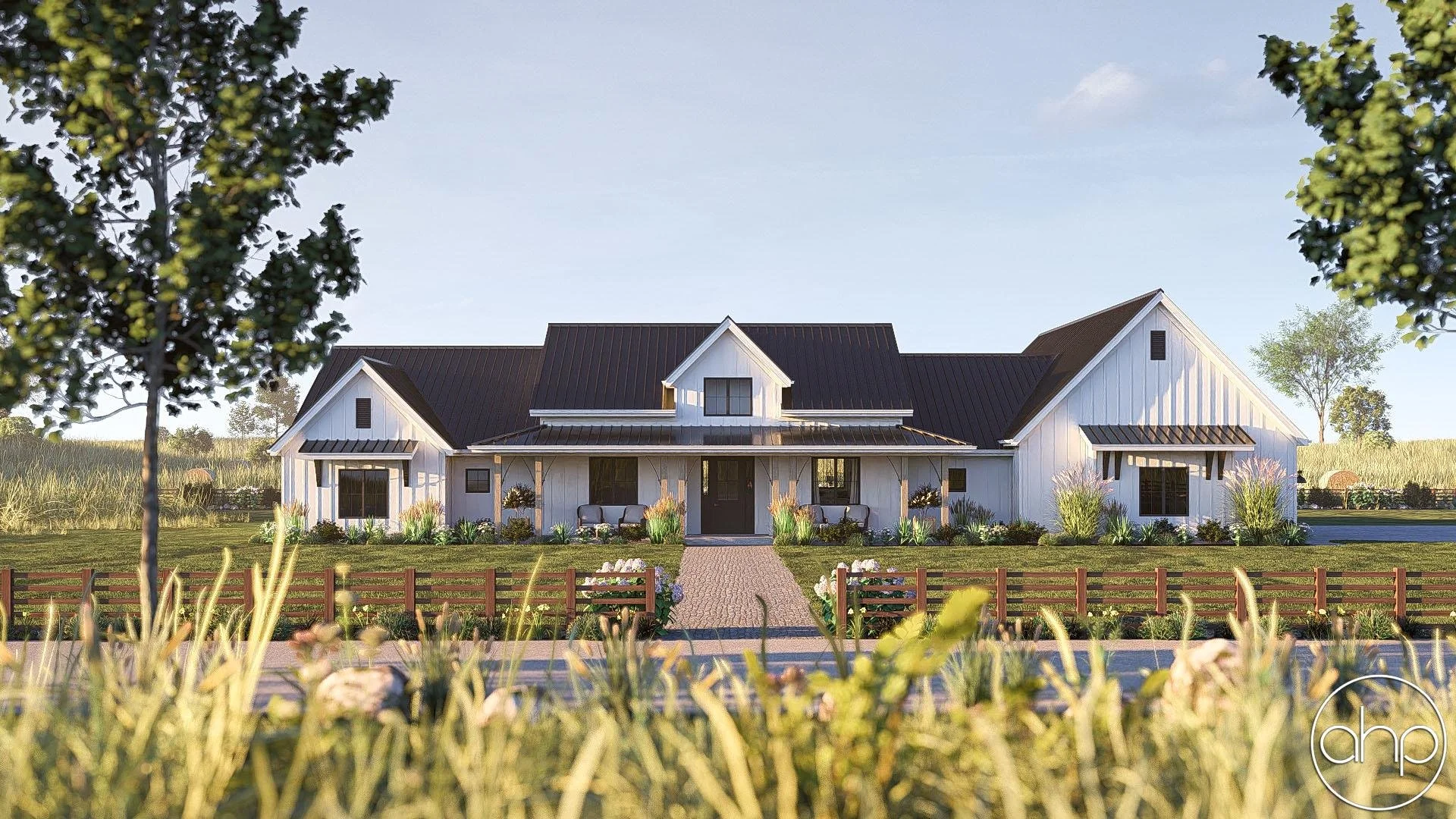 Modern farmhouse with white exterior and black roof, front porch, green lawn, trees, and a wooden fence