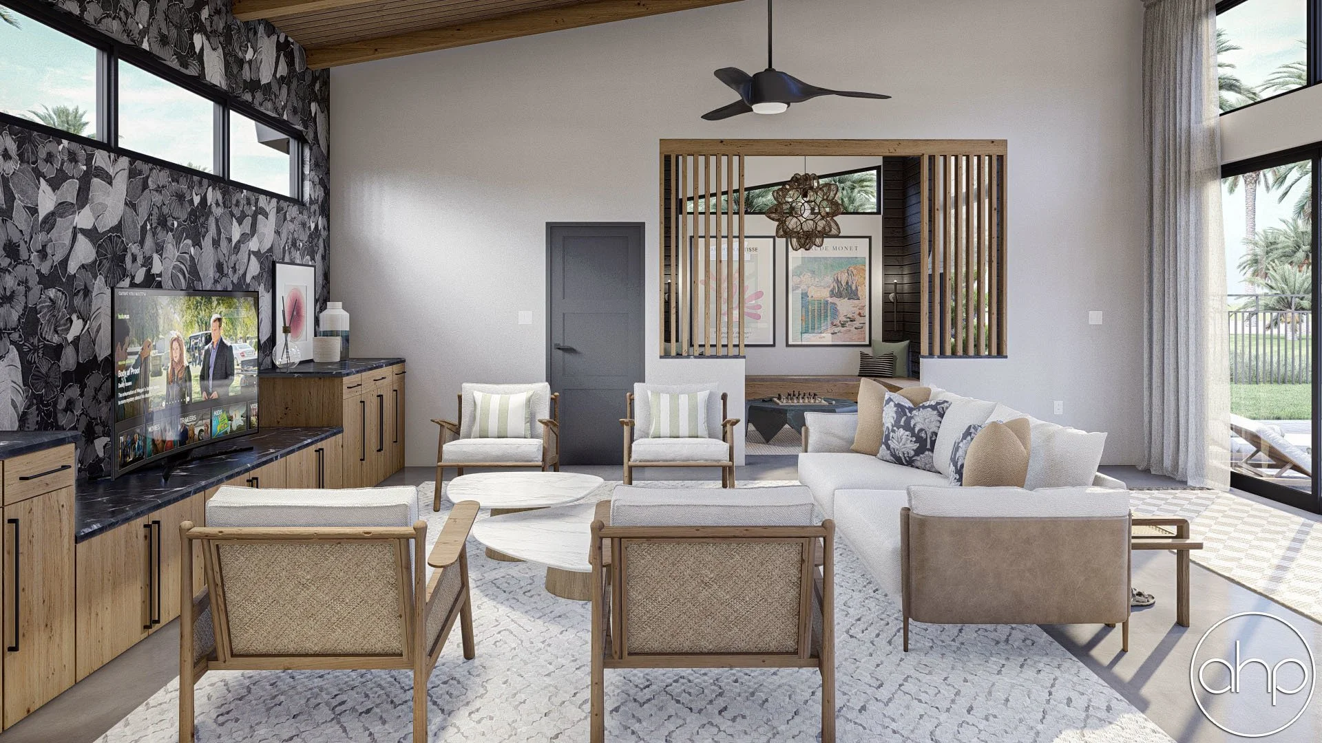 Living room with white couch, beige armchairs, a wooden coffee table, a black and wooden TV console, a patterned black and white wall, and sliding glass doors leading outside to a patio with palm trees.