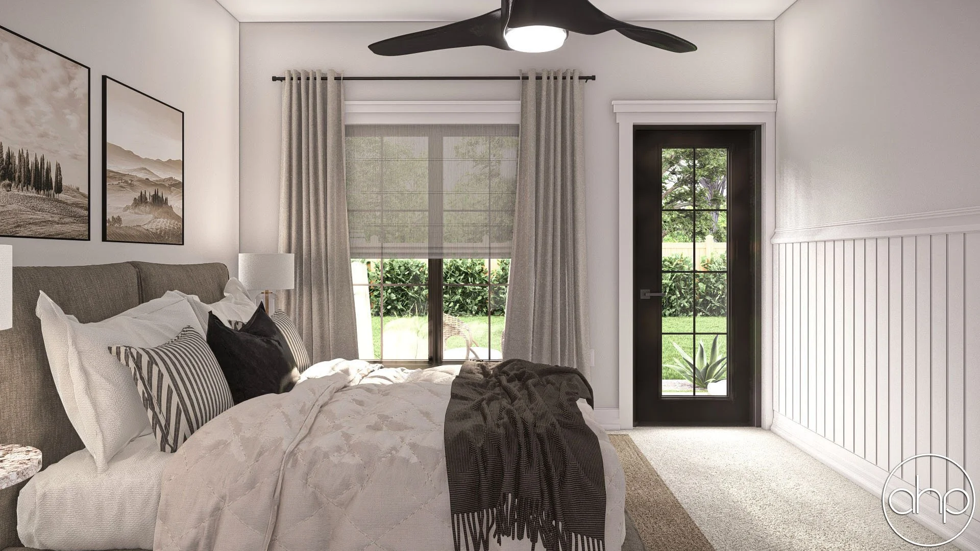 A cozy bedroom with a large bed, multiple pillows, and a throw blanket, next to a window with curtains and a glass door leading outside to a garden view.