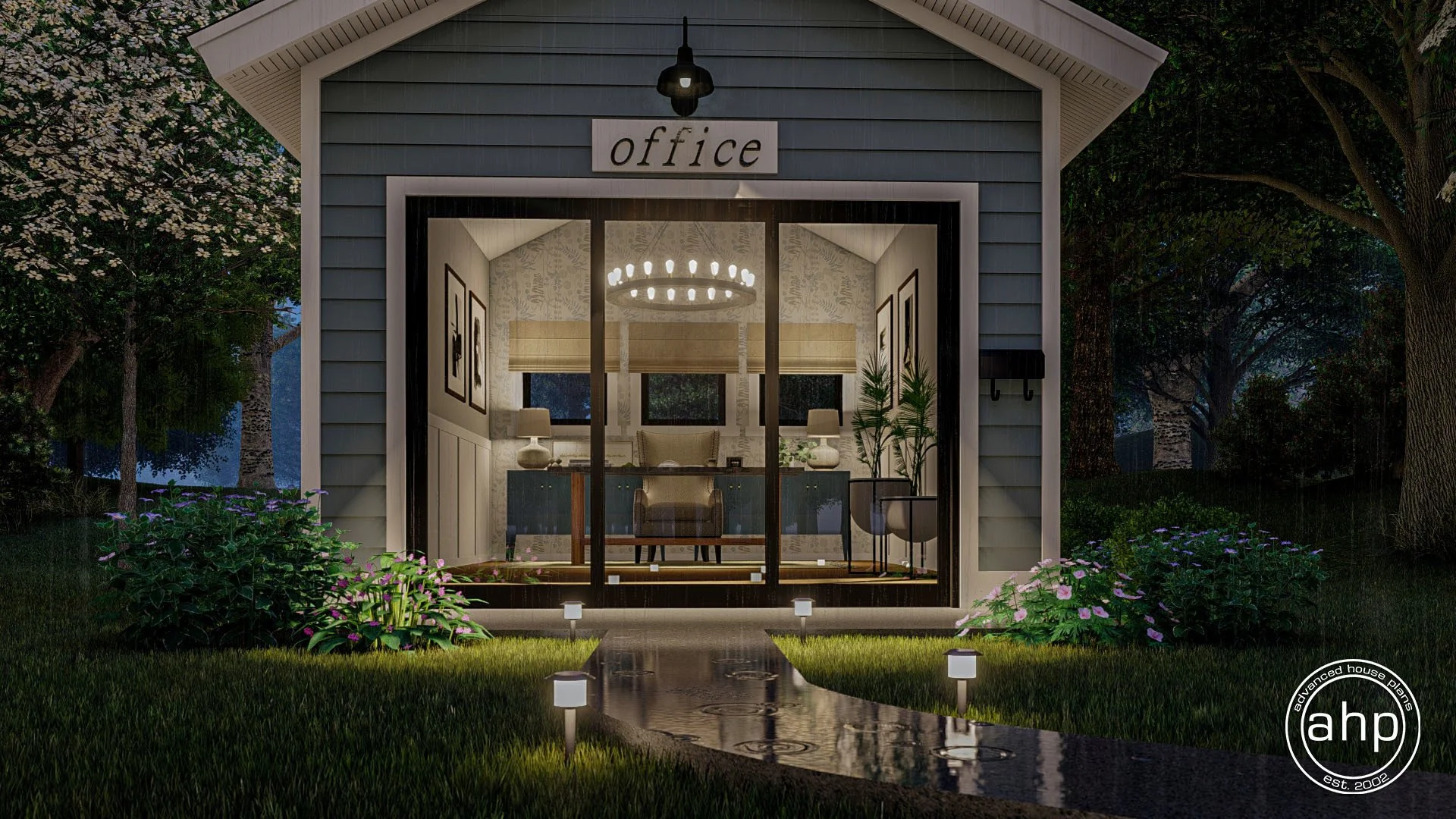 A small blue house with a large front window, labeled 'office,' showing a cozy interior with a chandelier, plants, and furniture, surrounded by green grass and trees, with pathway lights leading to the entrance.