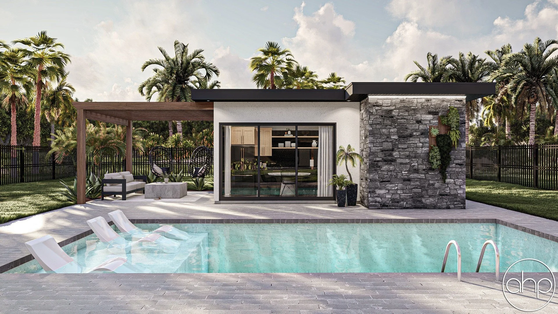 Modern backyard with a swimming pool, lounge chairs, two black hanging chairs, outdoor seating area with a concrete table, and a small building with a stone wall, large sliding glass door, and wooden pergola, surrounded by palm trees.