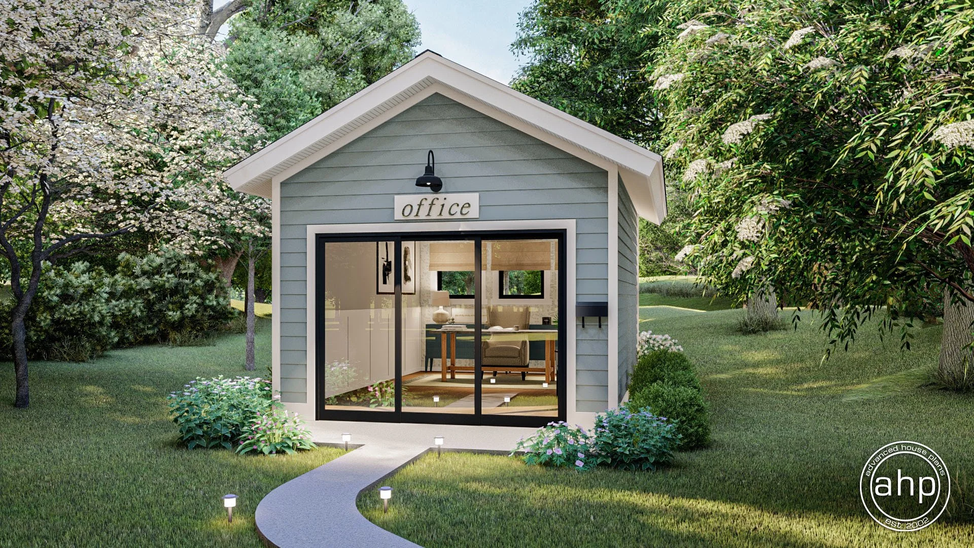 A small house with a sign that reads "office" above the door, surrounded by trees and landscaped garden. The interior is visible through large glass sliding doors, showing a cozy workspace with a desk, chair, and side table.