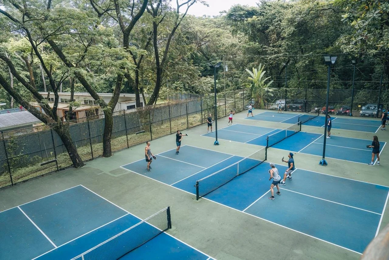 Playing pickleball on our Nosara court