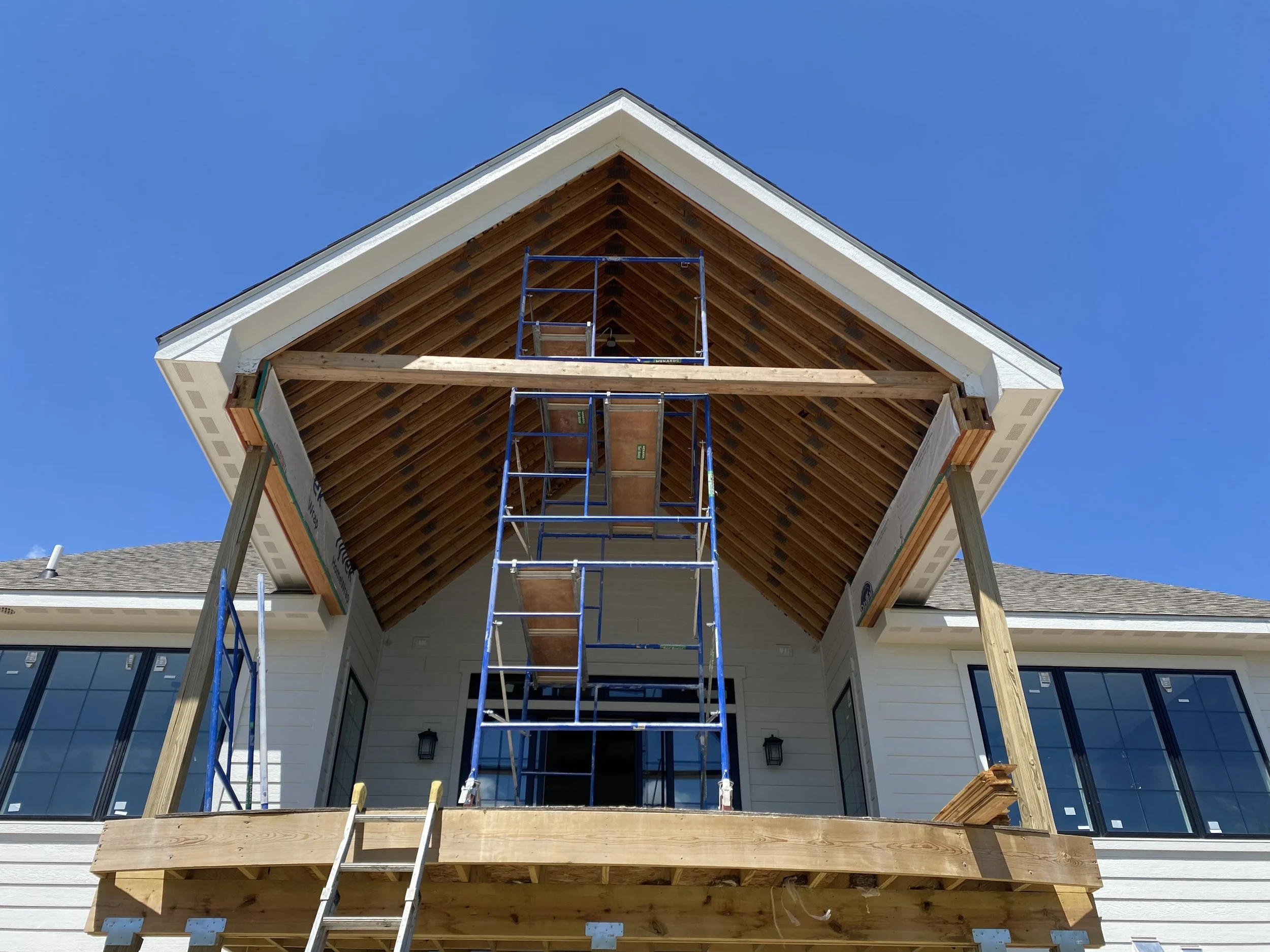 Soffit and fascia installation along the roofline with uniform edges and professional exterior finish in Kenosha, Wisconsin.