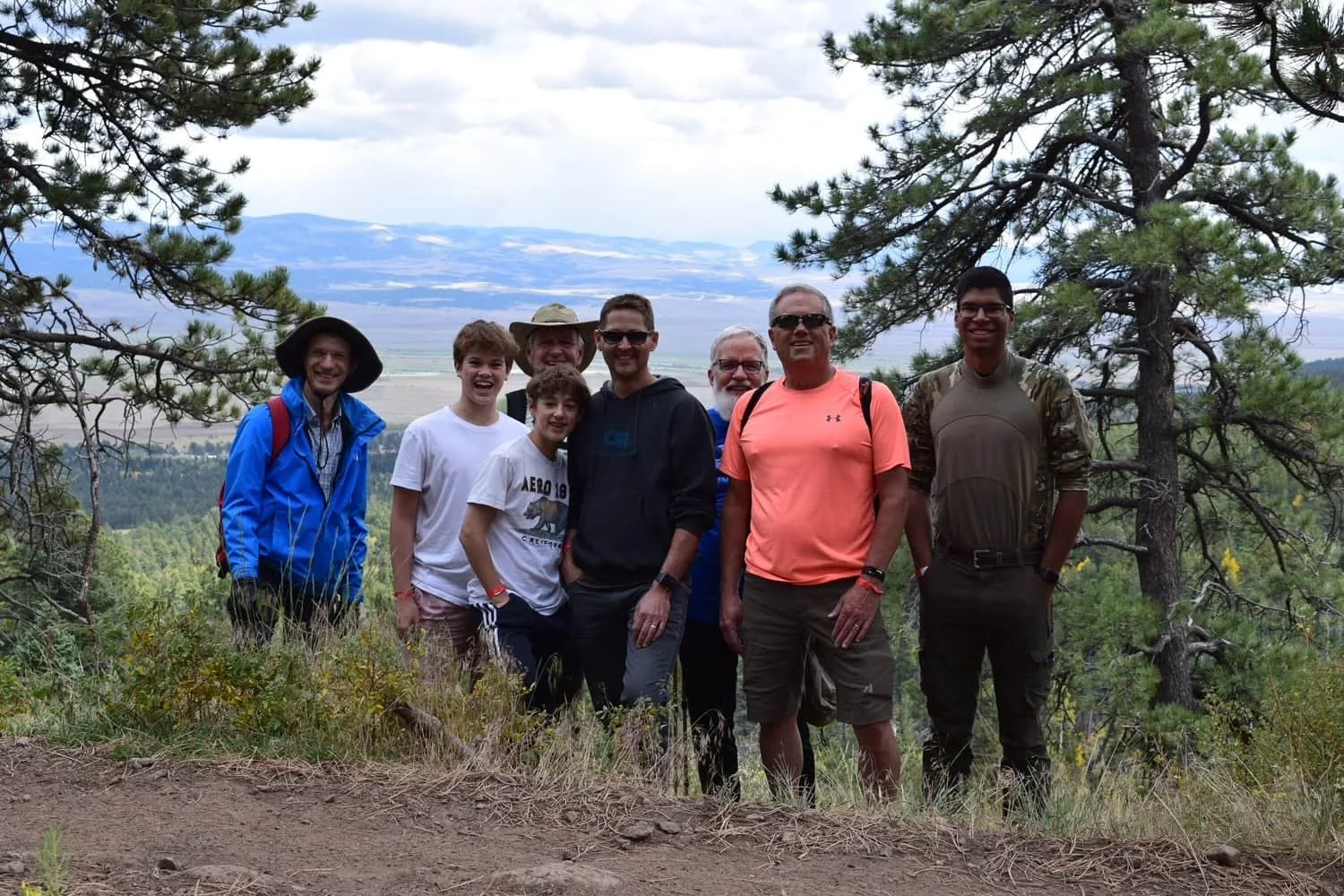 Forestgate Men hiking together.