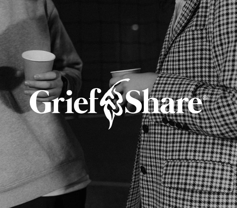 Two people holding cups, standing together. The words “Grief Share” are overlaid in large text at the center of the image.