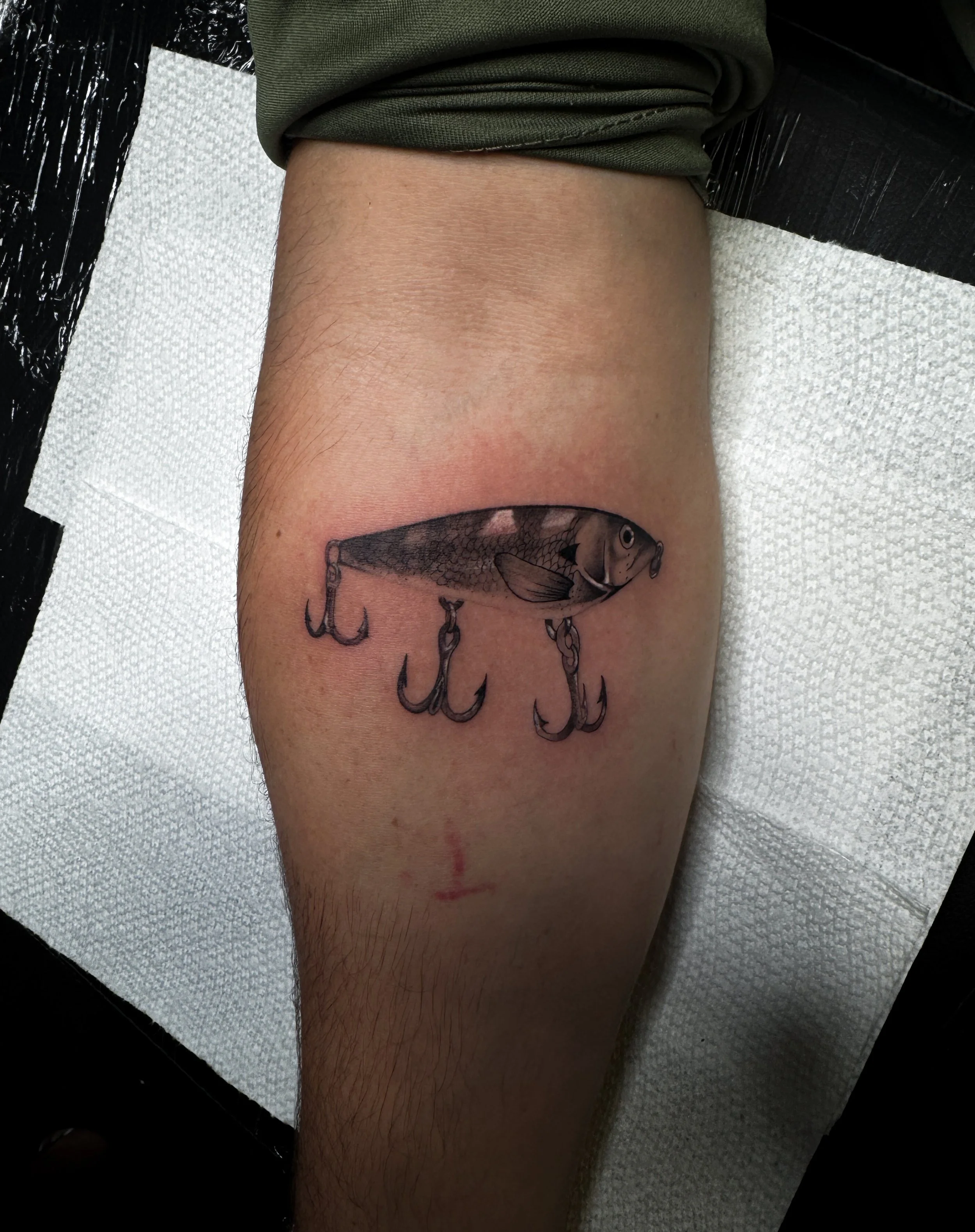 fish tattoo, black and grey realism fish tattoo, fine line fish tattoo in Stuart, Sewall’s Point, Hutchinson Island, Jensen Beach, Palm City, Port St. Lucie, Fort pierce, treasure coast and surrounding South Florida areas