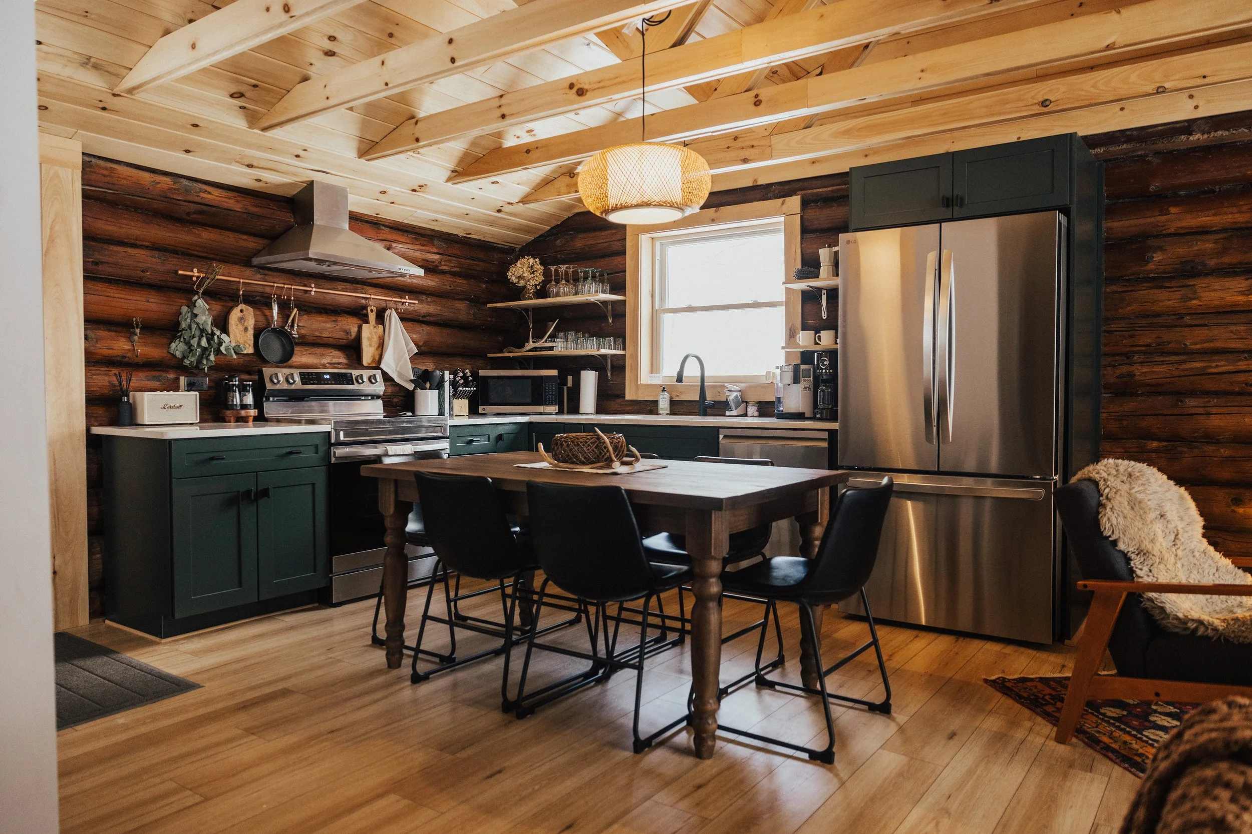 KITCHEN ~
The eat-in kitchen is fully stocked and comfortably seats six guests.