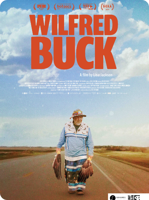 Poster for the film "Wilfred Buck" by Lisa Jackson, featuring a man in a cowboy hat and patterned clothing walking down an empty road in a rural landscape with clouds in the sky.