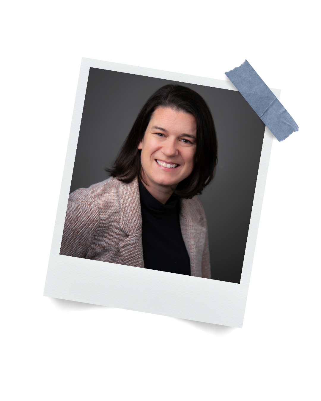A photo of Audrey Quinn - Co-President at Bizable.  She has shoulder-length dark hair smiling, wearing a blazer over a black top, against a dark grey background.