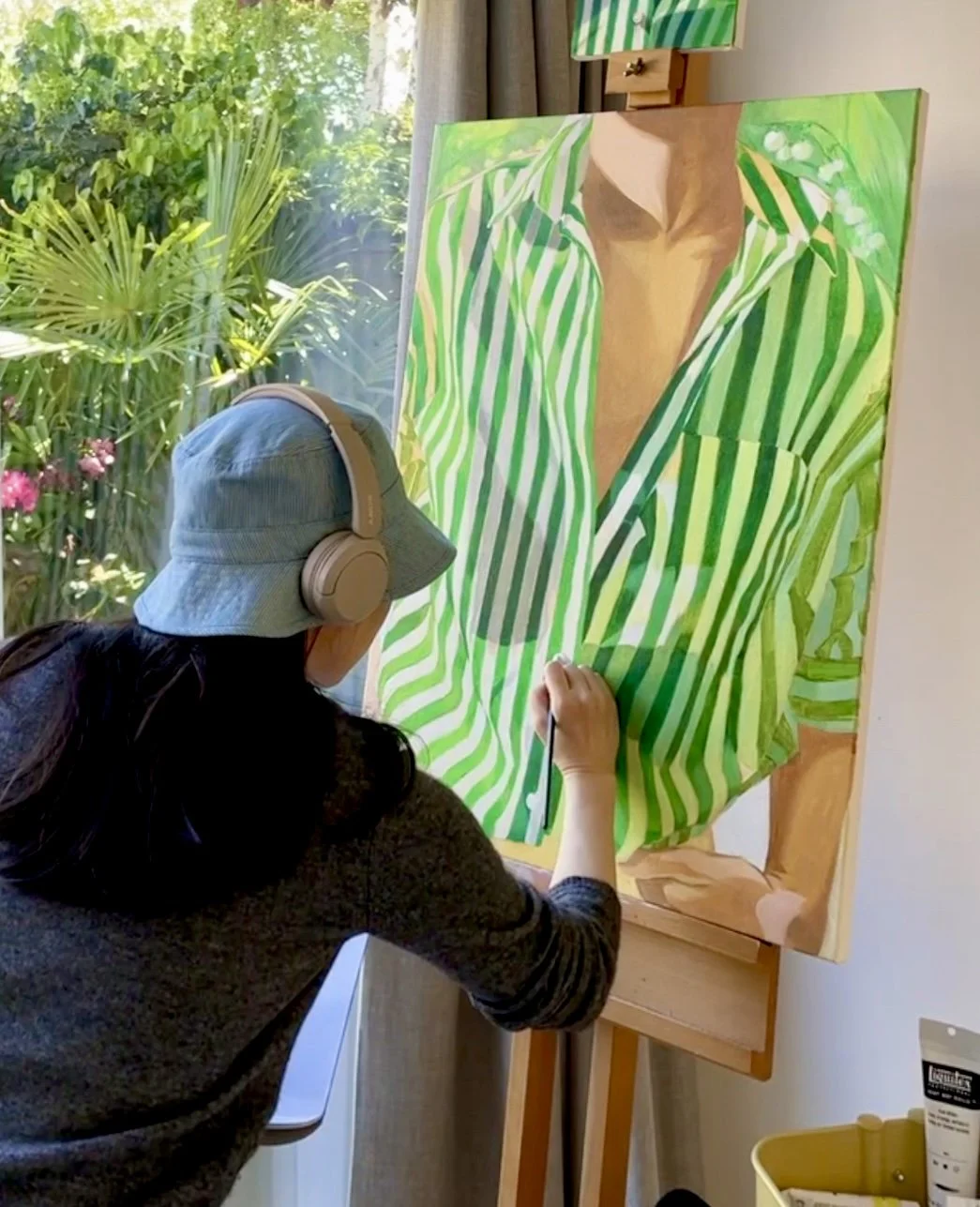 Artist Ara Youn is working on Lily of the Valley painting