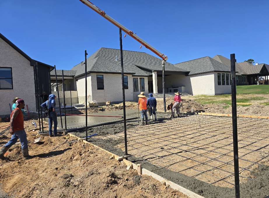 Laying out backyard concrete space.