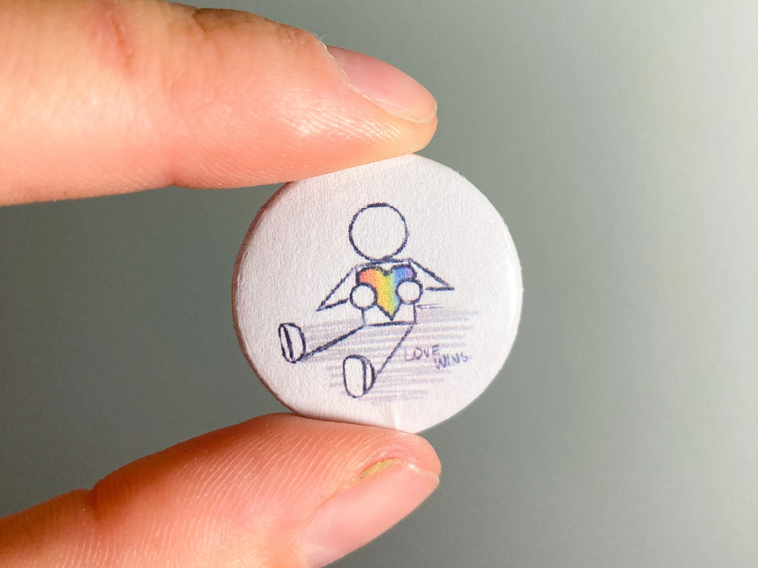 Doodle Figure Holding a Heart Pin