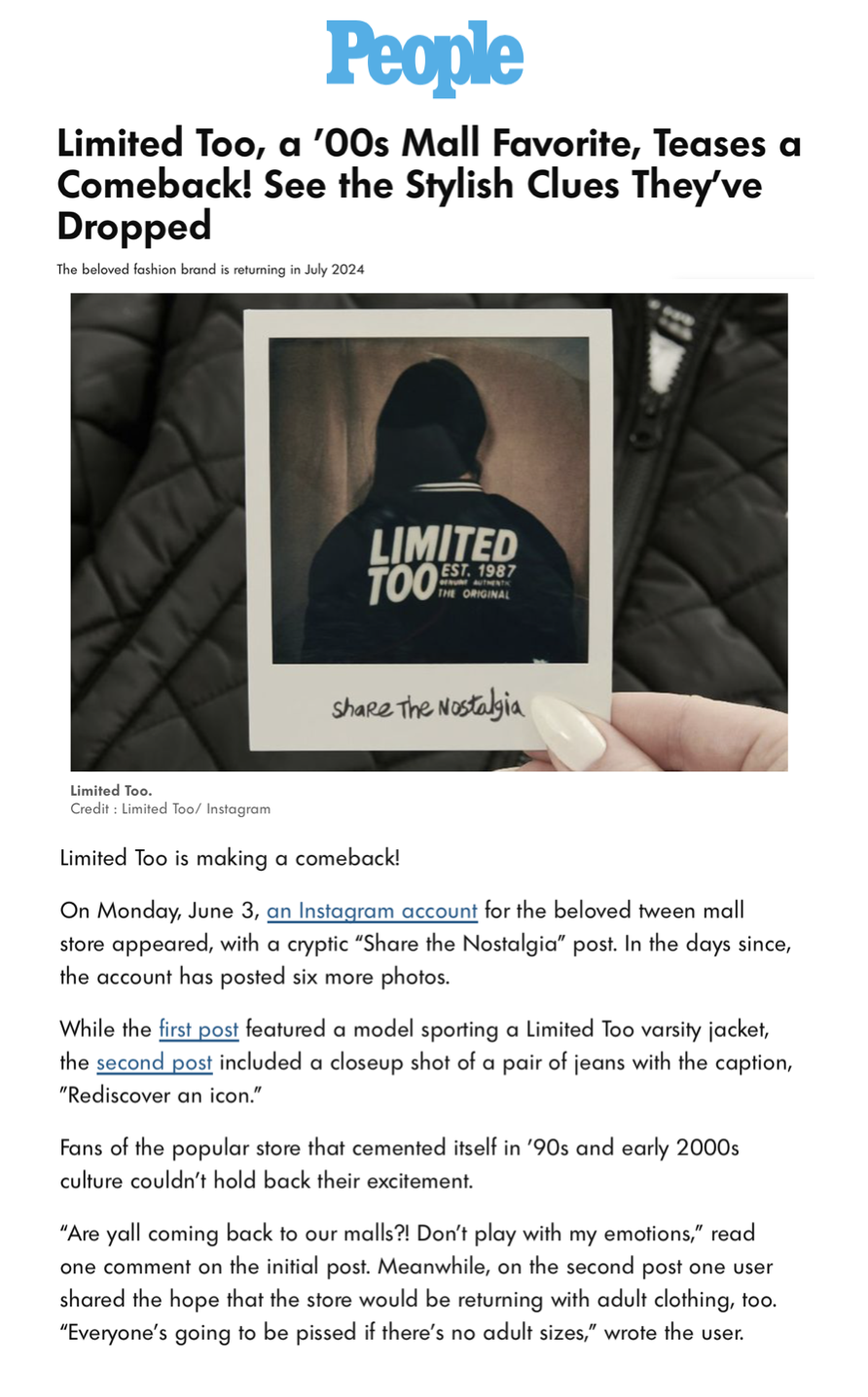Photograph of a person holding a Polaroid photo of a person from behind wearing a black jacket with the words "Limited Too" on the back. The person in the photo has short hair and is set against a dark background.