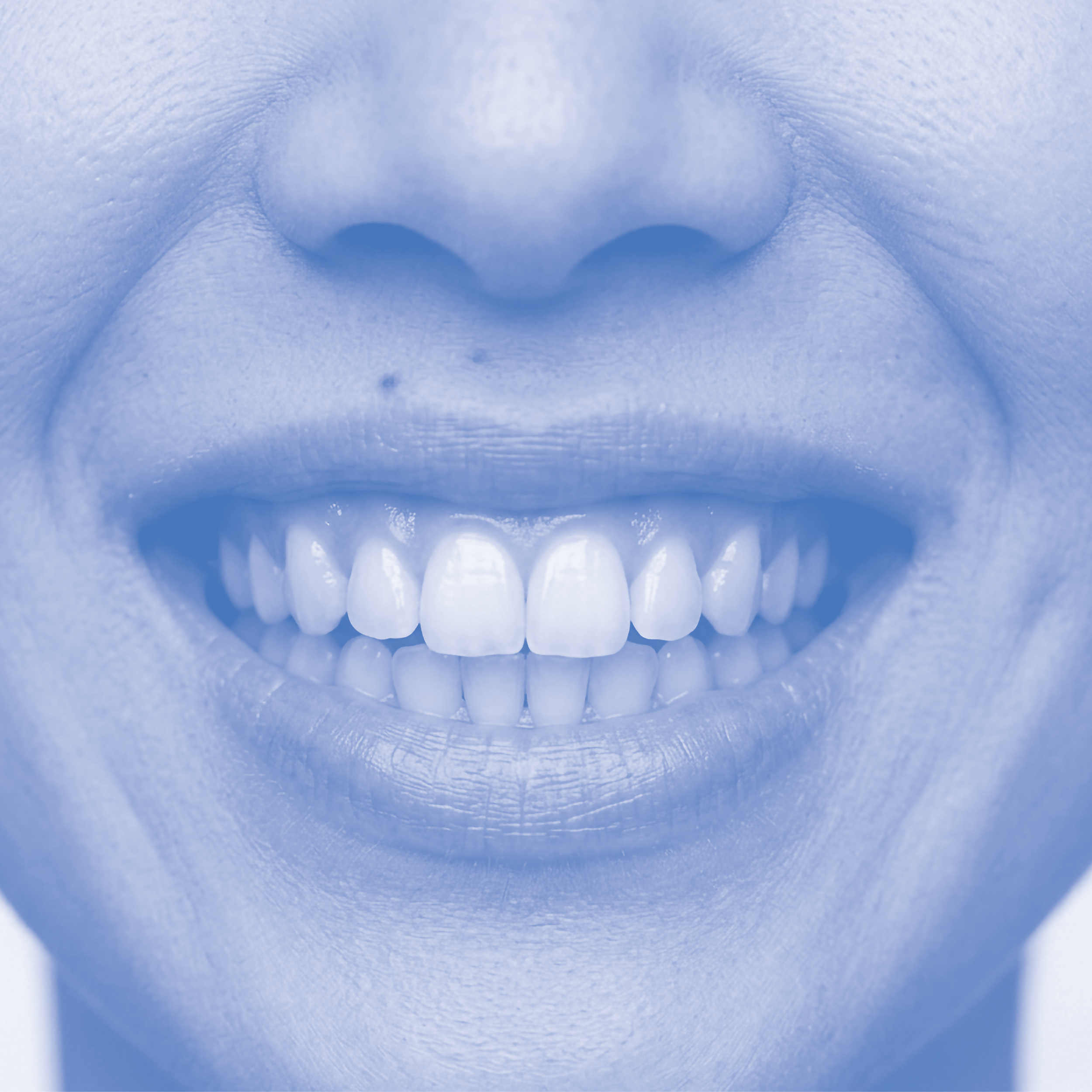 Close-up of a smiling person's mouth showing teeth and lips, in blue monochrome.