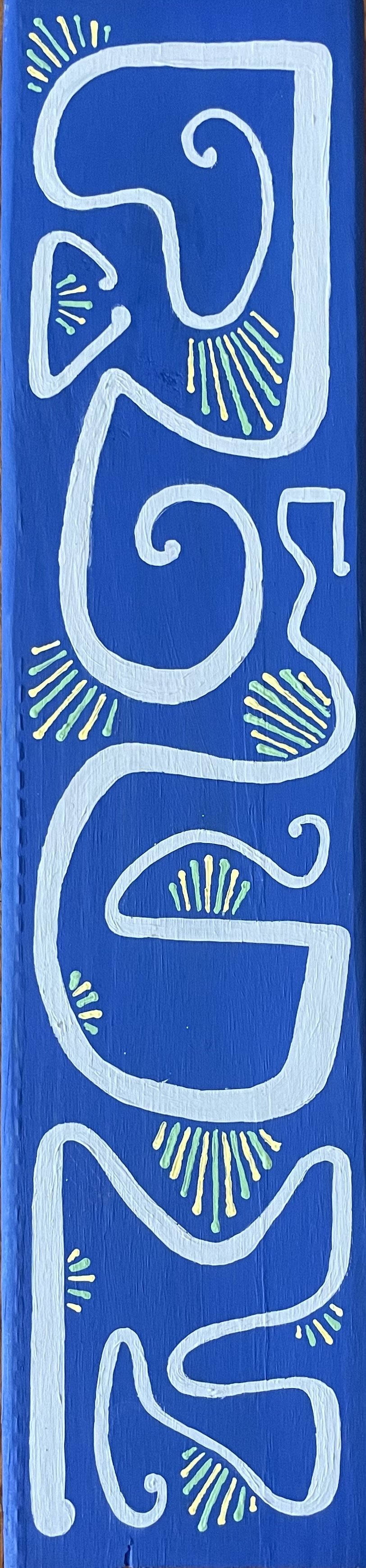 The word "CREATE" written vertically in colorful, stylized letters on a blue background with yellow and green radiating lines around each letter.