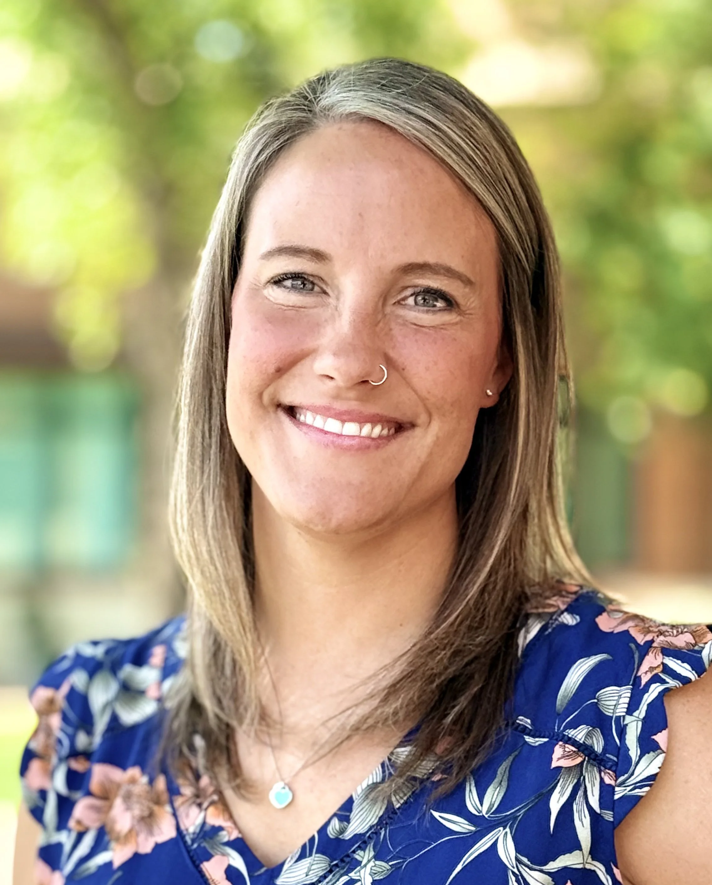 Emily Wilson, EMDR Certified Therapist and CEO of Elizabeth and Associates, smiling in professional headshot for Chandler Arizona counseling practice