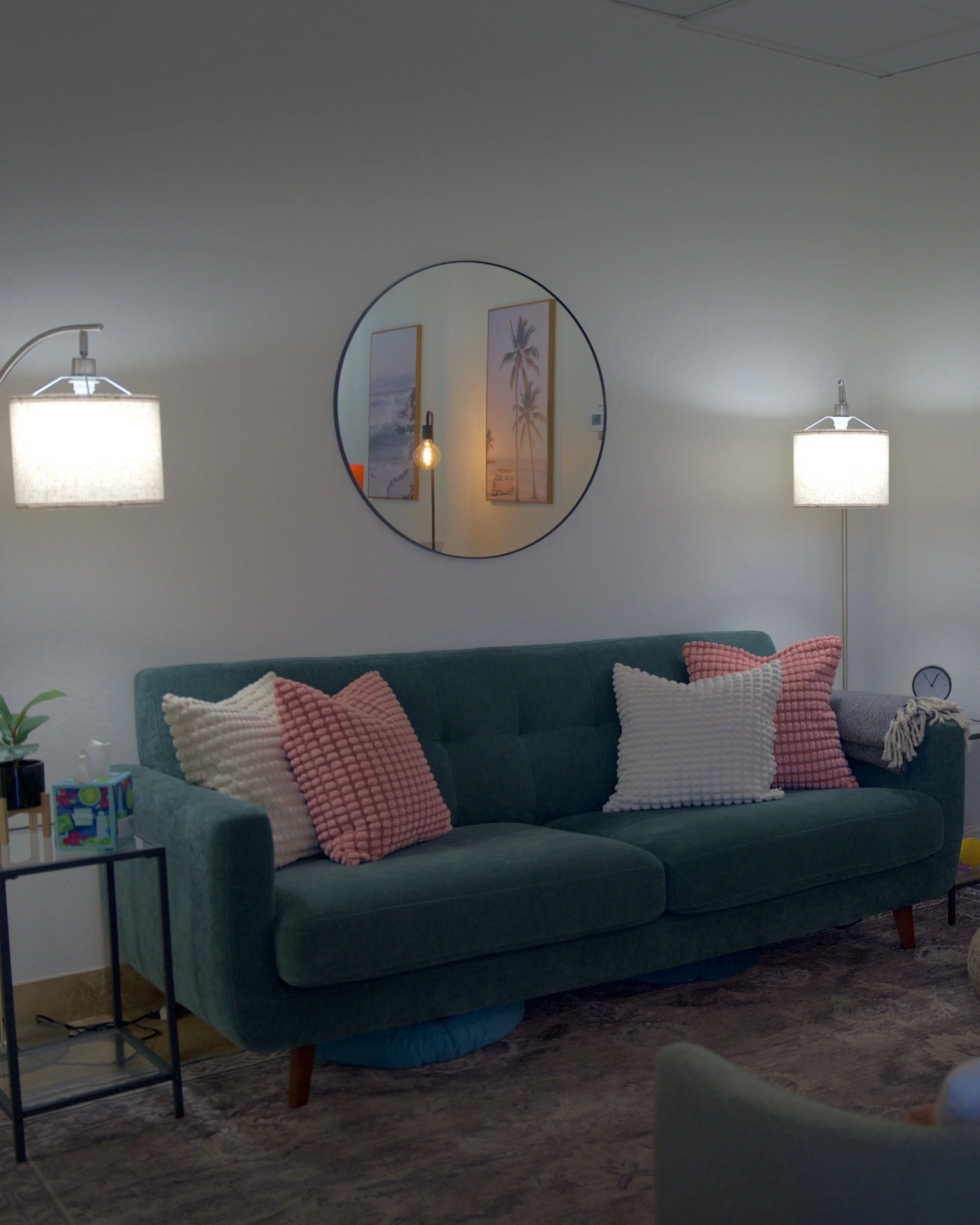 Comfortable counseling room with a sofa and warm lighting