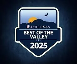 A badge with a mountain and sun graphic, reading 'Frontiersman Best of the Valley 2025'.