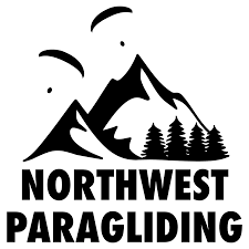 Logo of Northwest Paragliding featuring mountains, trees, and paragliding two paragliders in the sky.