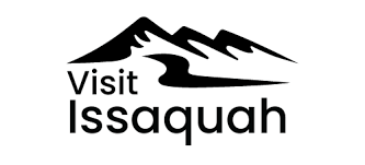 A logo featuring a stylized mountain range with the text 'Visit Issaquah' below it.