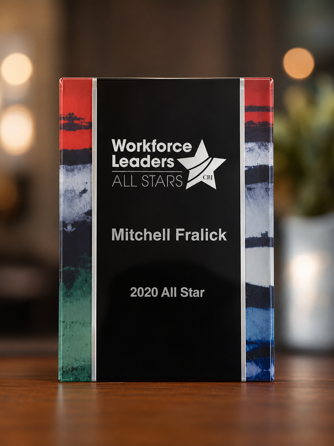 Mitchell Fralick receiving Workforce Leaders All Stars 2020 recognition award for excellence in employee benefits consulting and workforce leadership.