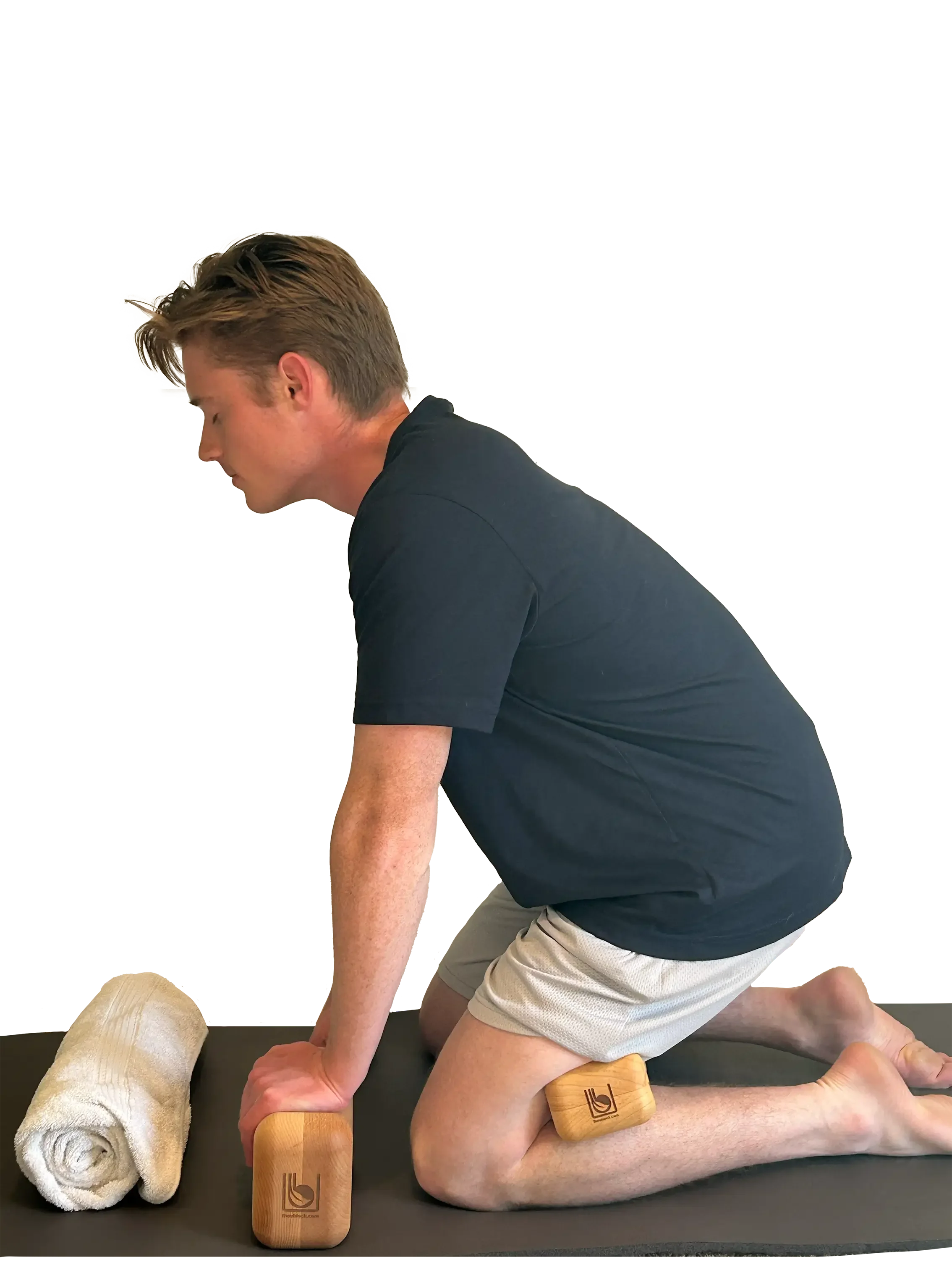 Person kneeling with wooden device called the Ublock, doing a pose to relief stress