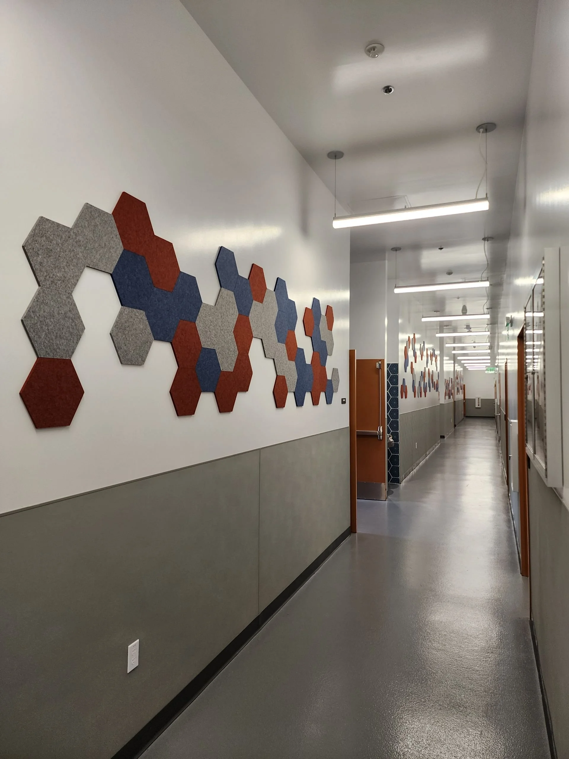 Hallway with noise dampening features