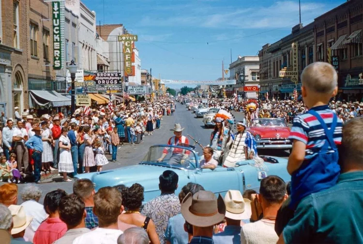 WYO Rodeo parade on Main Street Sheridan Wyoming circa 1958 showing Fryberger's sign at The New York Store building