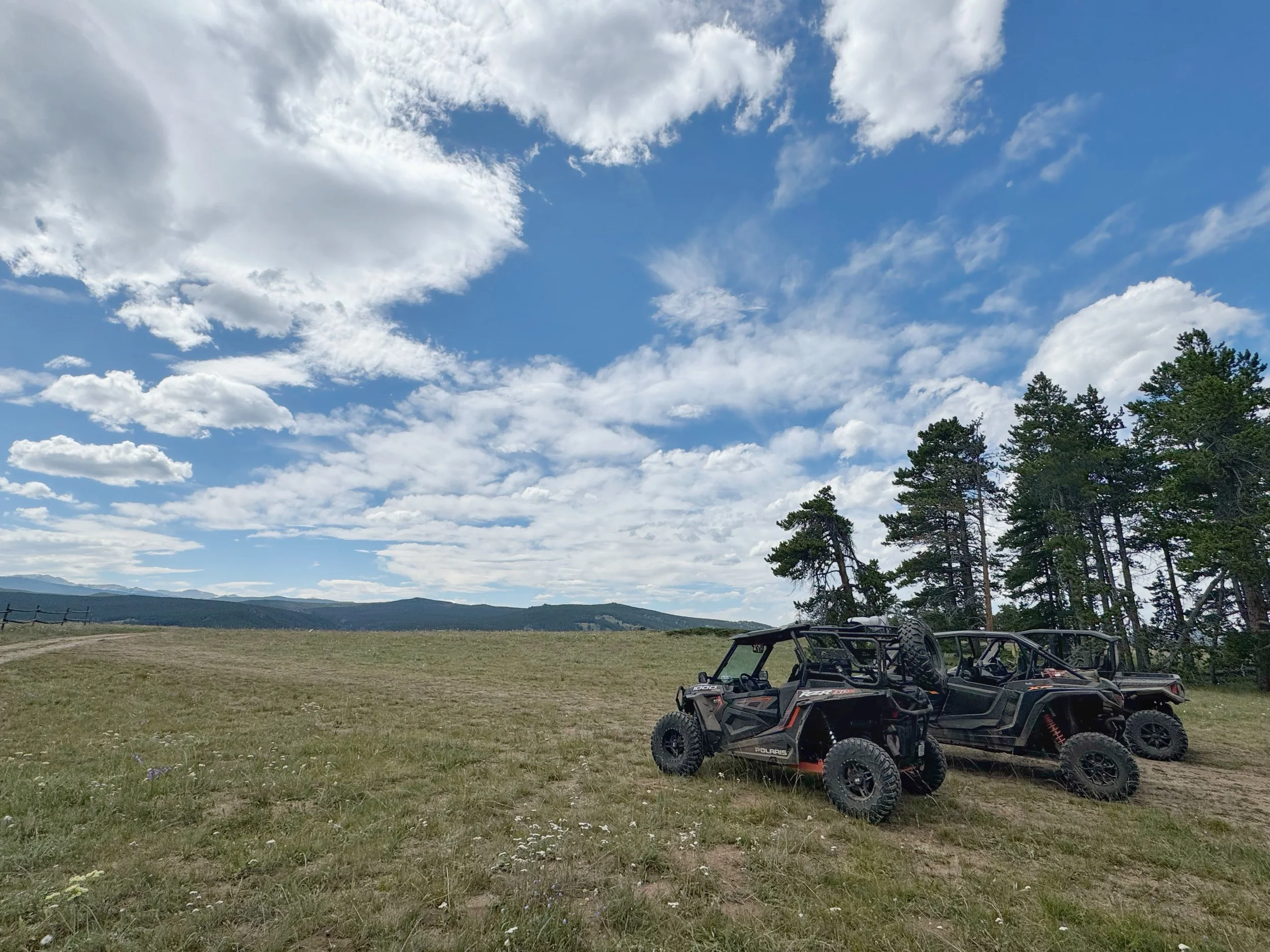 Side by side UTVs in the Big Horn Mountains near Sheridan Wyoming — accessing remote morel foraging terrain
