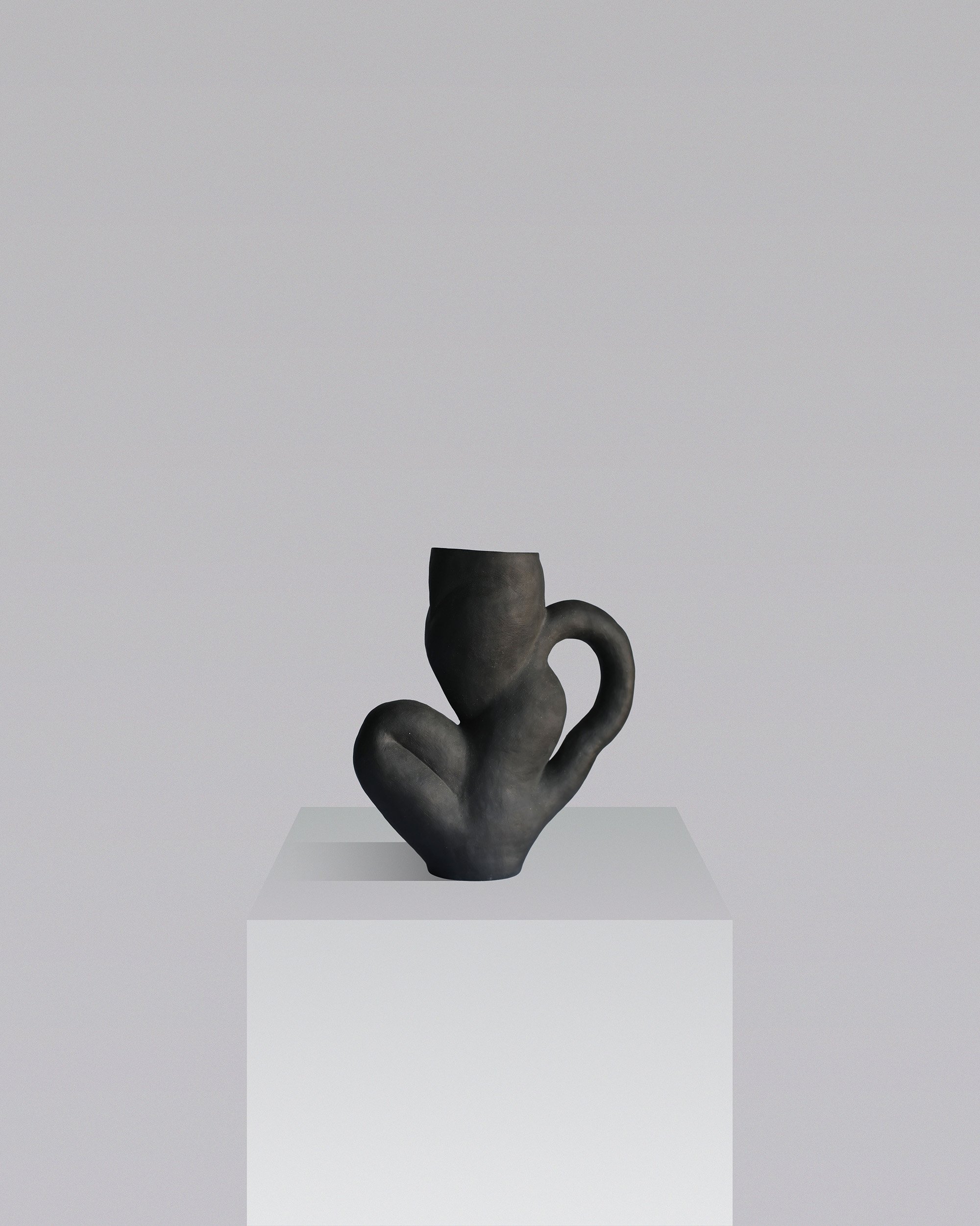 Seated-Figure-Vase_1.jpg