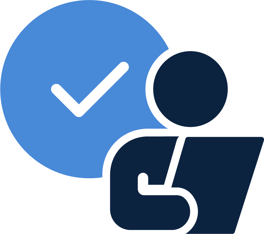 A simplified icon of a person sitting at a desk with a laptop, with a blue circle containing a white check mark behind them.