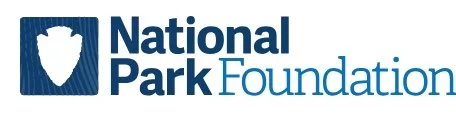 Logo of the National Park Foundation featuring a stylized shield and the organization’s name.