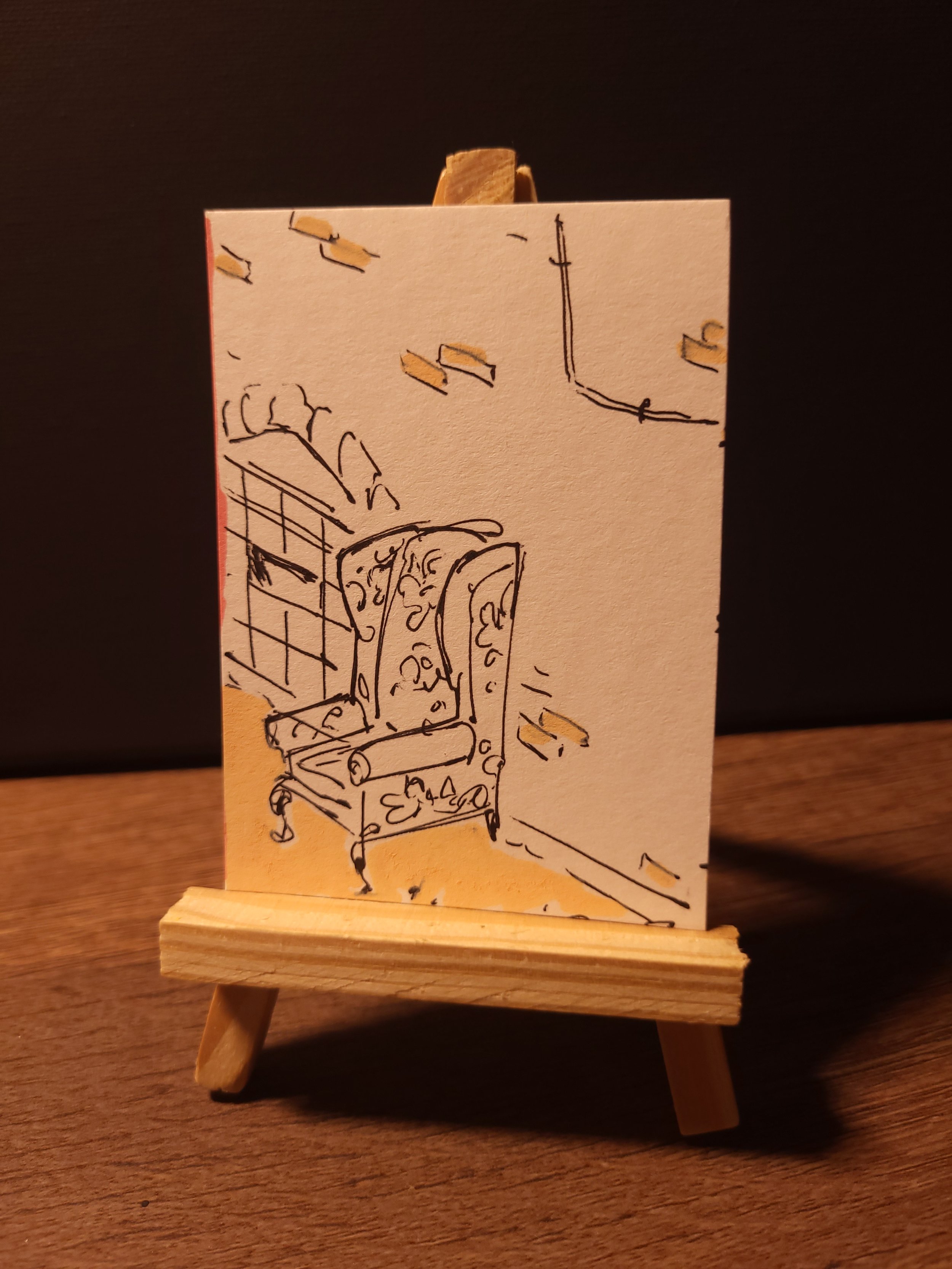 small painting of chair in an alley