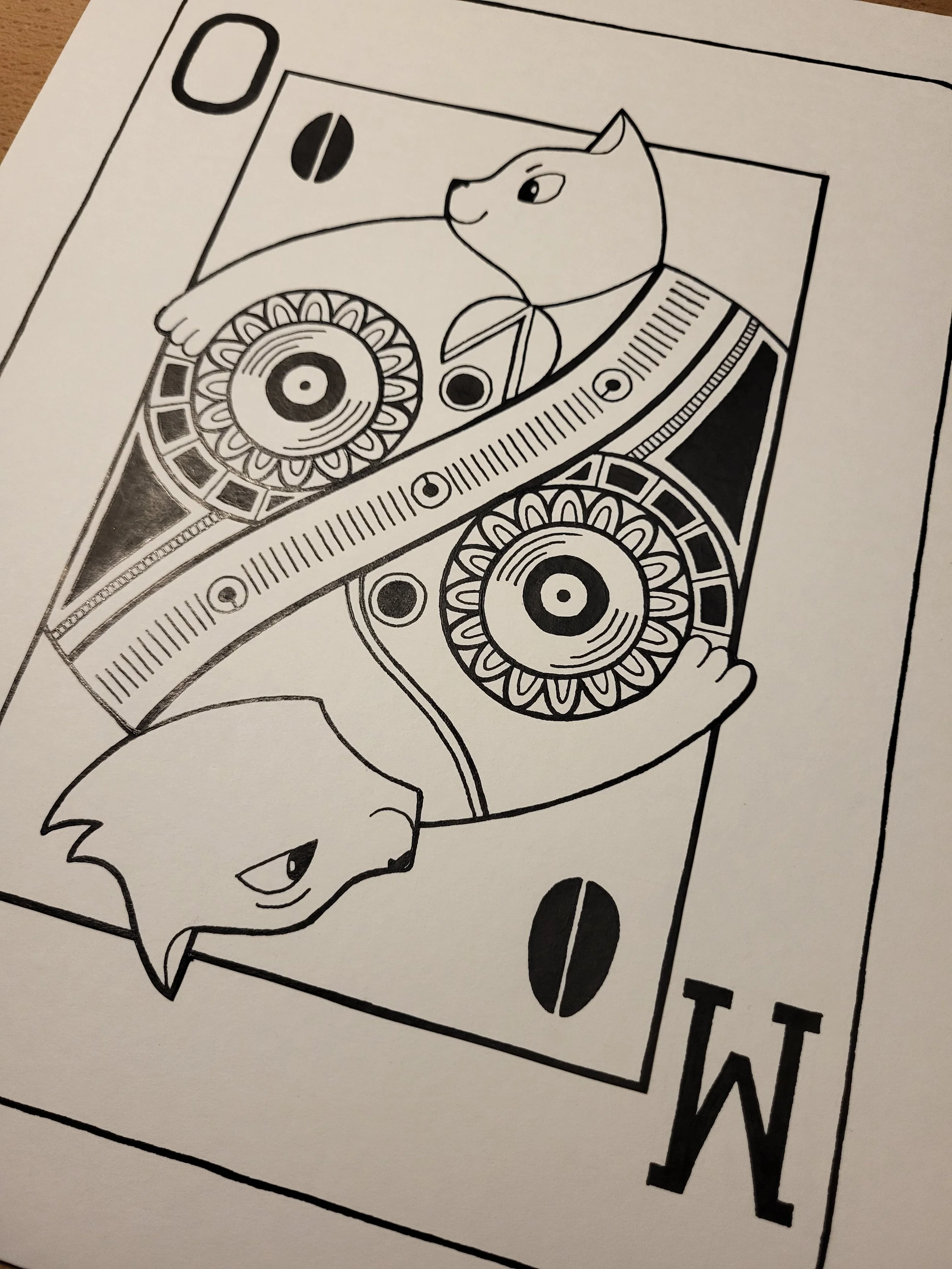 close up view of inked card design with cats instead of kings