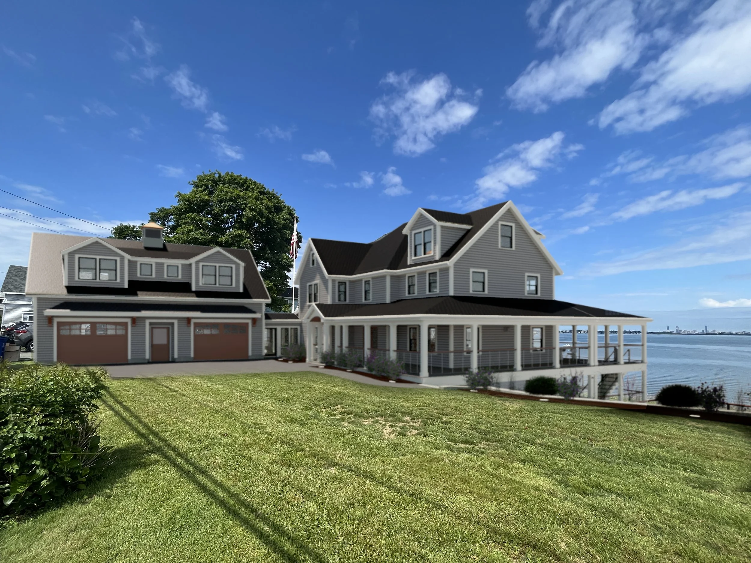A large, modern house by a body of water with a blue sky and scattered clouds, featuring a spacious porch and a secondary garage building.