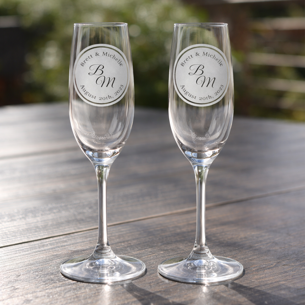 Personalized monogram champagne flutes, stemless wine, rocks glass,  with circular design, names, and wedding date engraving