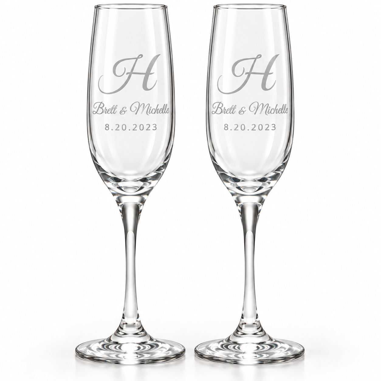 Personalized champagne flute set of 2 with script monogram, names and wedding date, permanently sand-carved.