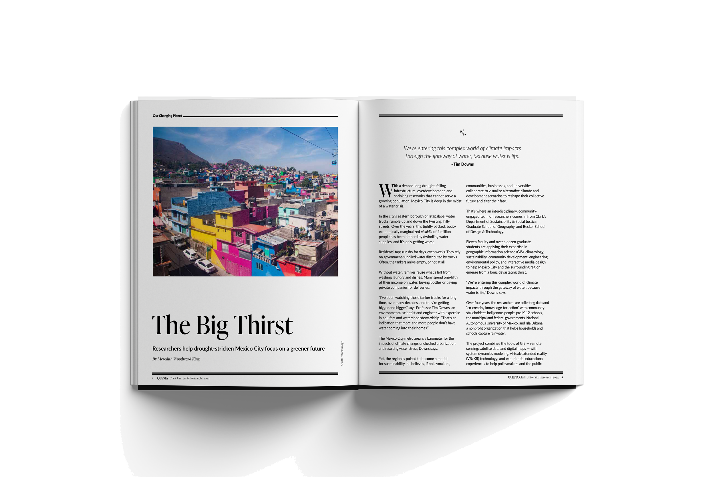 Open magazine on a gray surface showing a colorful cityscape photo of densely packed buildings in Mexico City with mountains in the background, and article titled "The Big Thirst" about climate impacts and water resources.