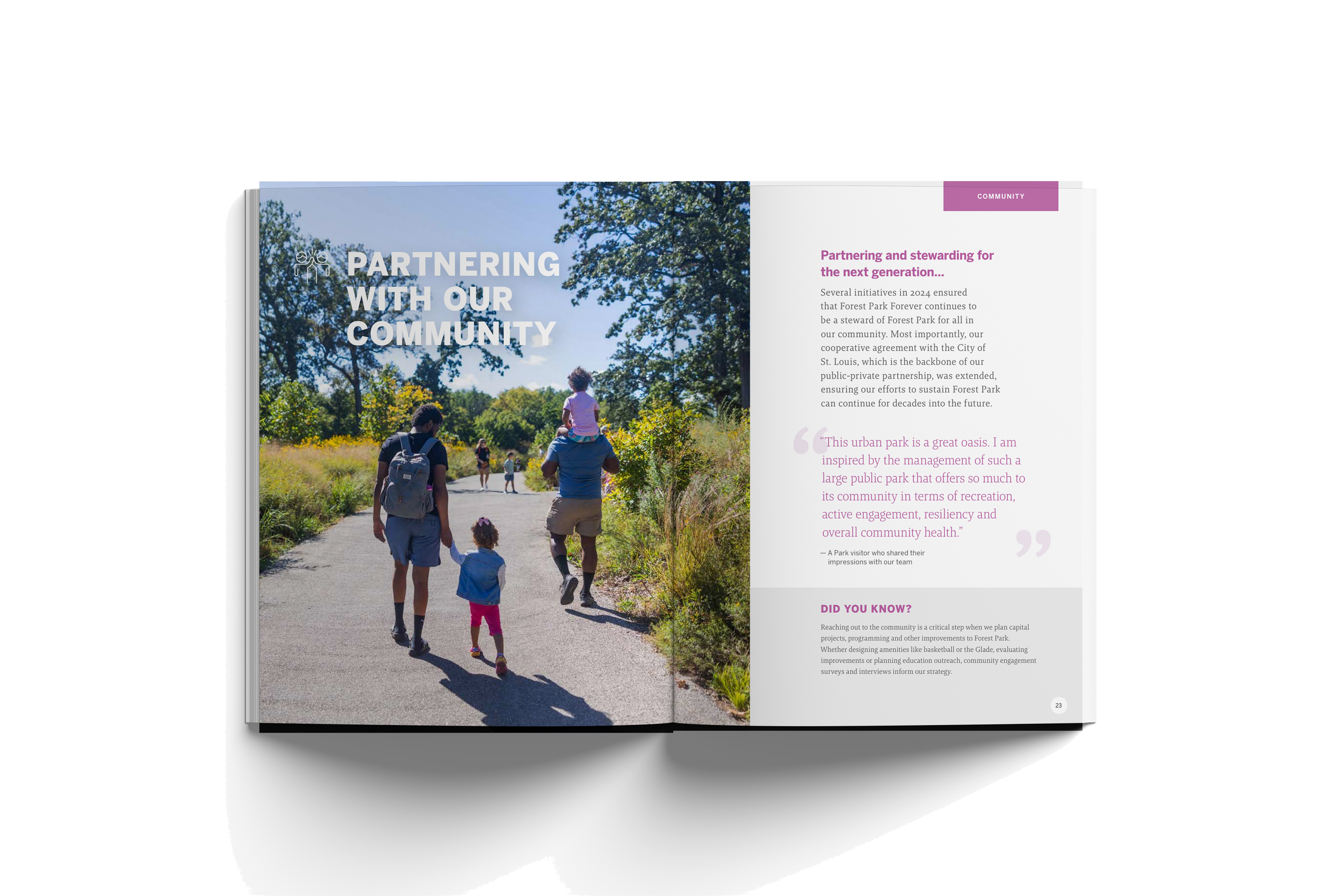 Open magazine spread showing families walking on a trail in a park with trees and greenery, with the headline 'Partnering with Our Community'.