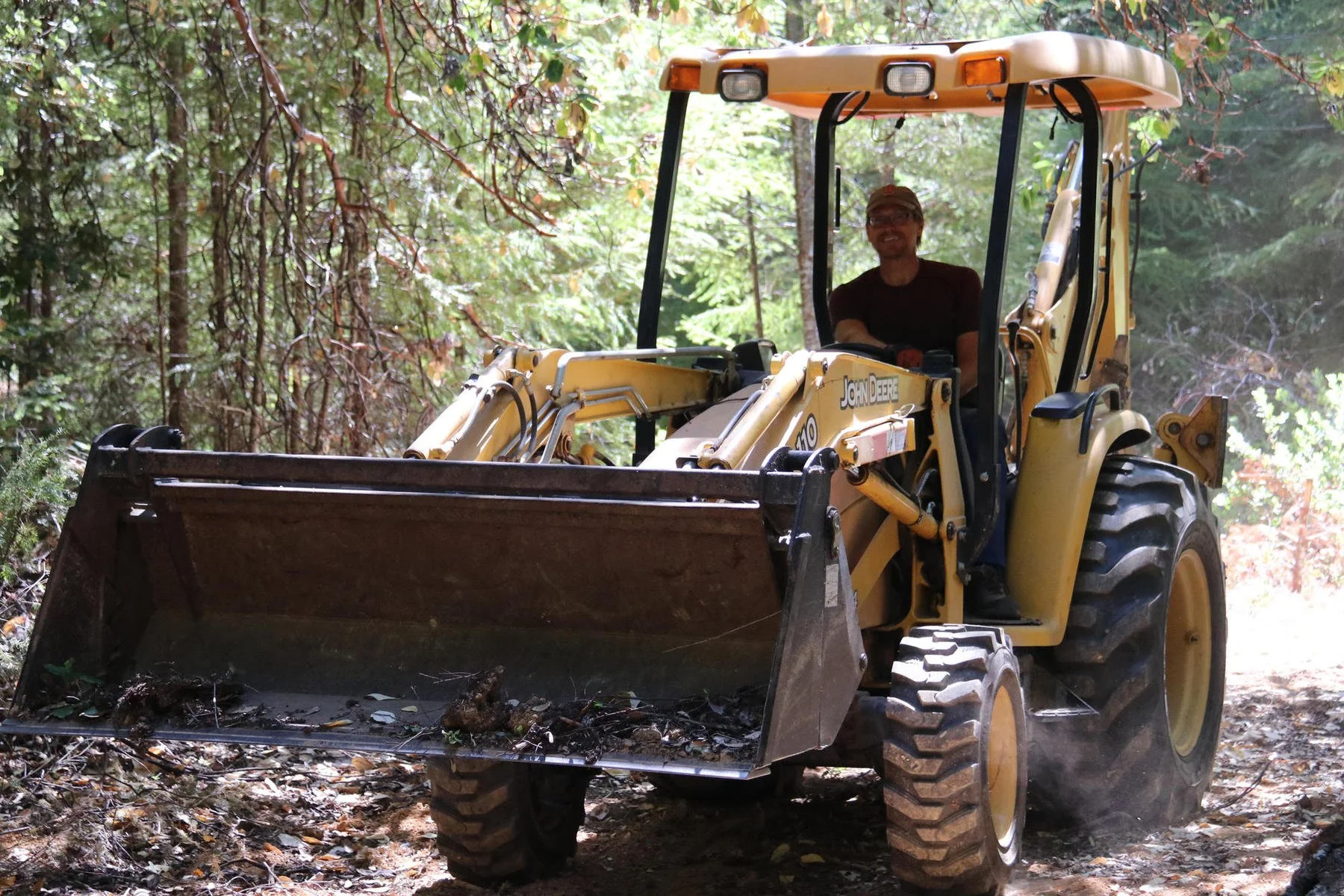 1Chris bio driving front loader _result.jpg