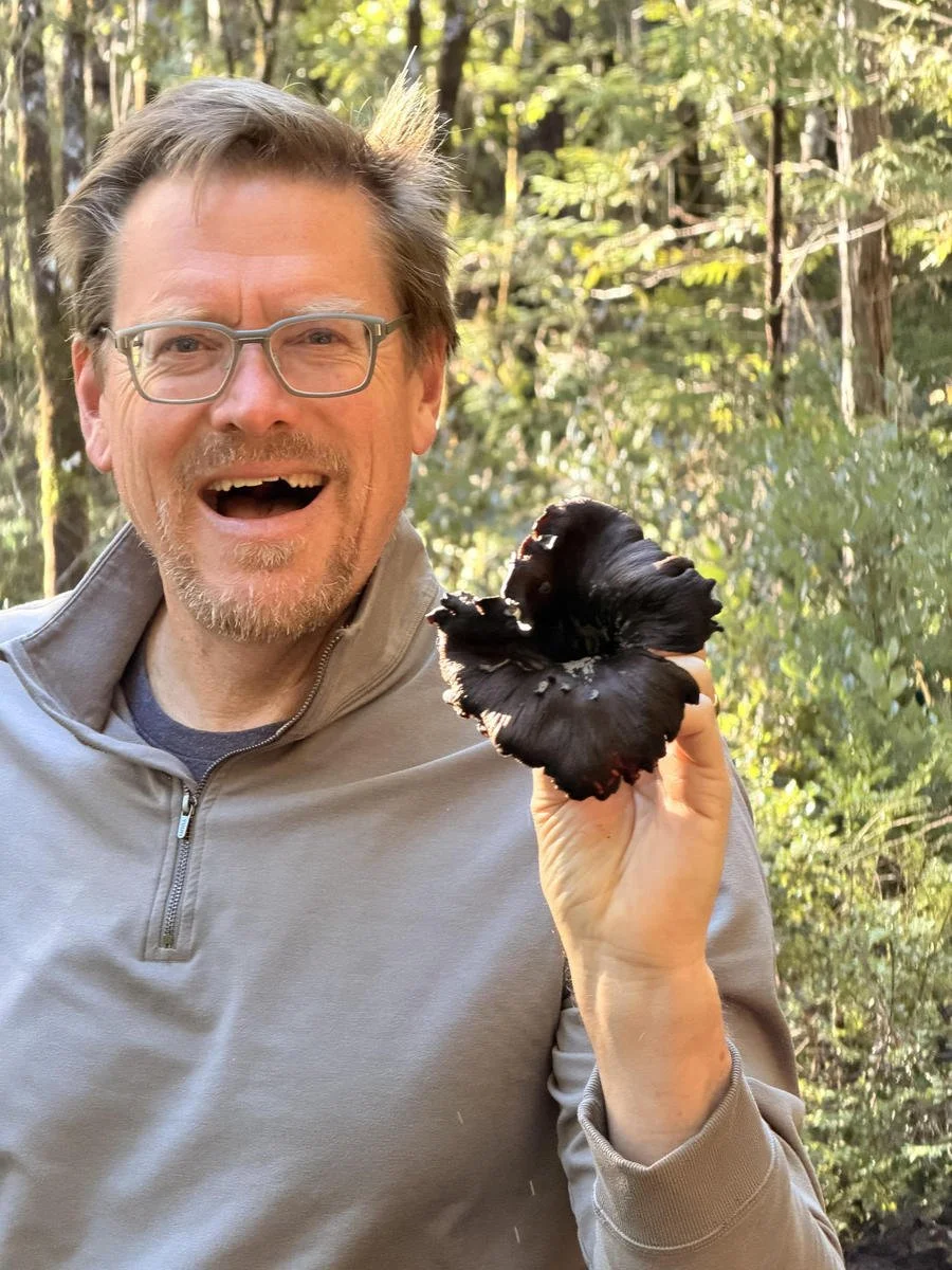 1Chris bio with large black trumpet mushroom foraged from forest_result.jpg