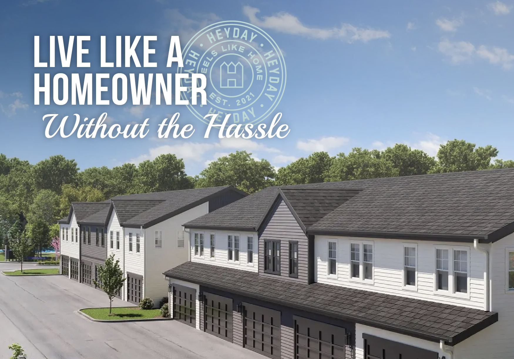 Houses in a residential neighborhood with trees and a blue sky.