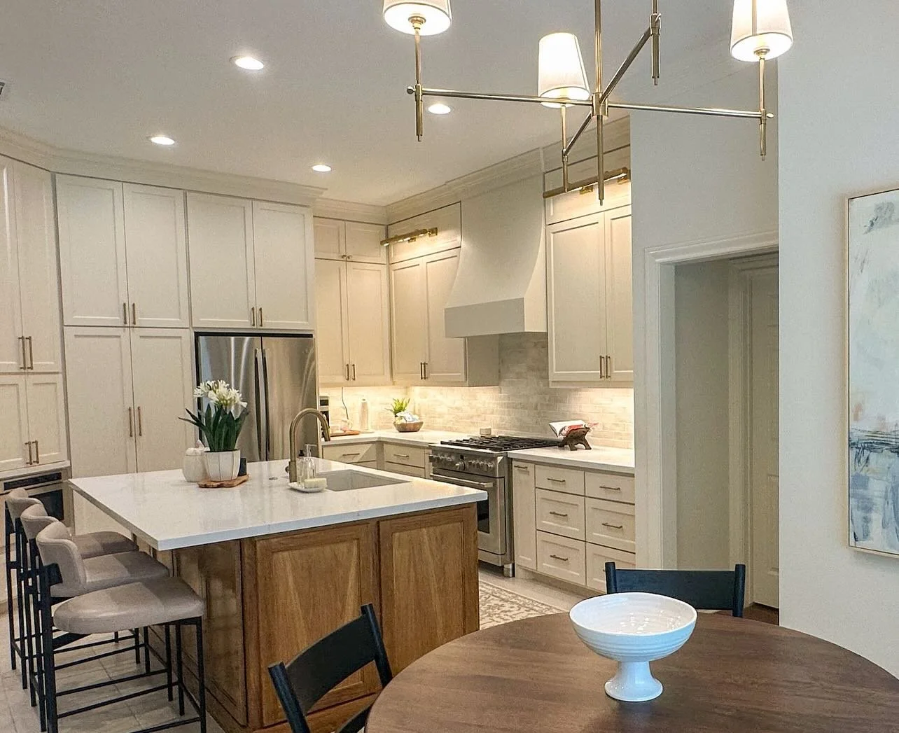 Clean sight lines and an intentional layout set the foundation&mdash;but it&rsquo;s how this space lives that mattered most. By opening the kitchen to the living room, we created a seamless transition that invites movement, conversation, and connecti