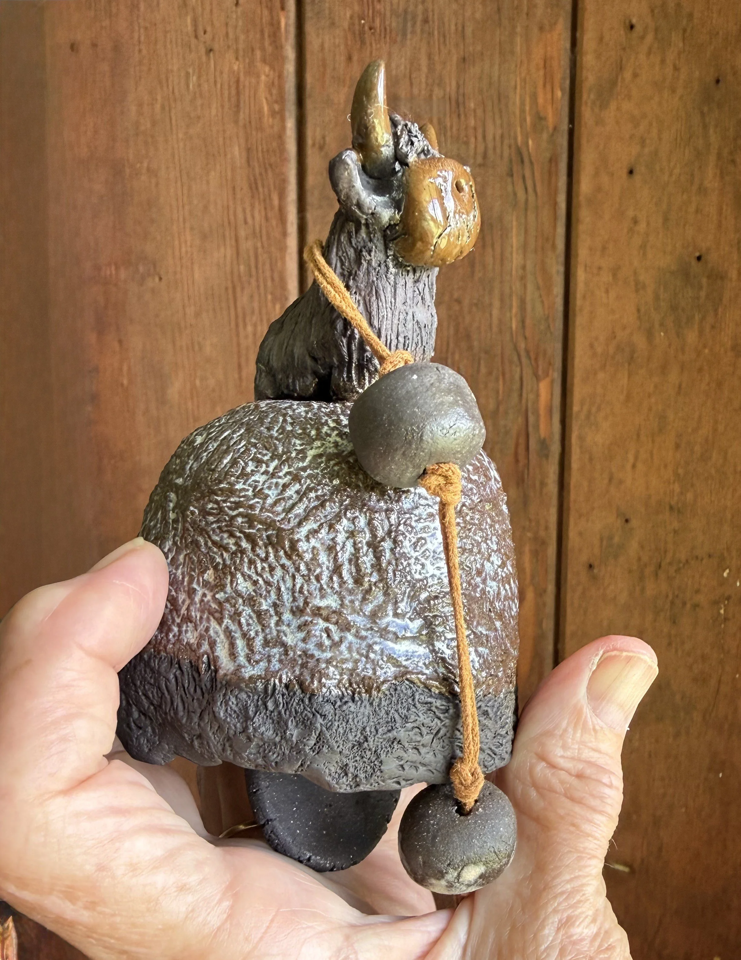 Rustic bell with highland cow
