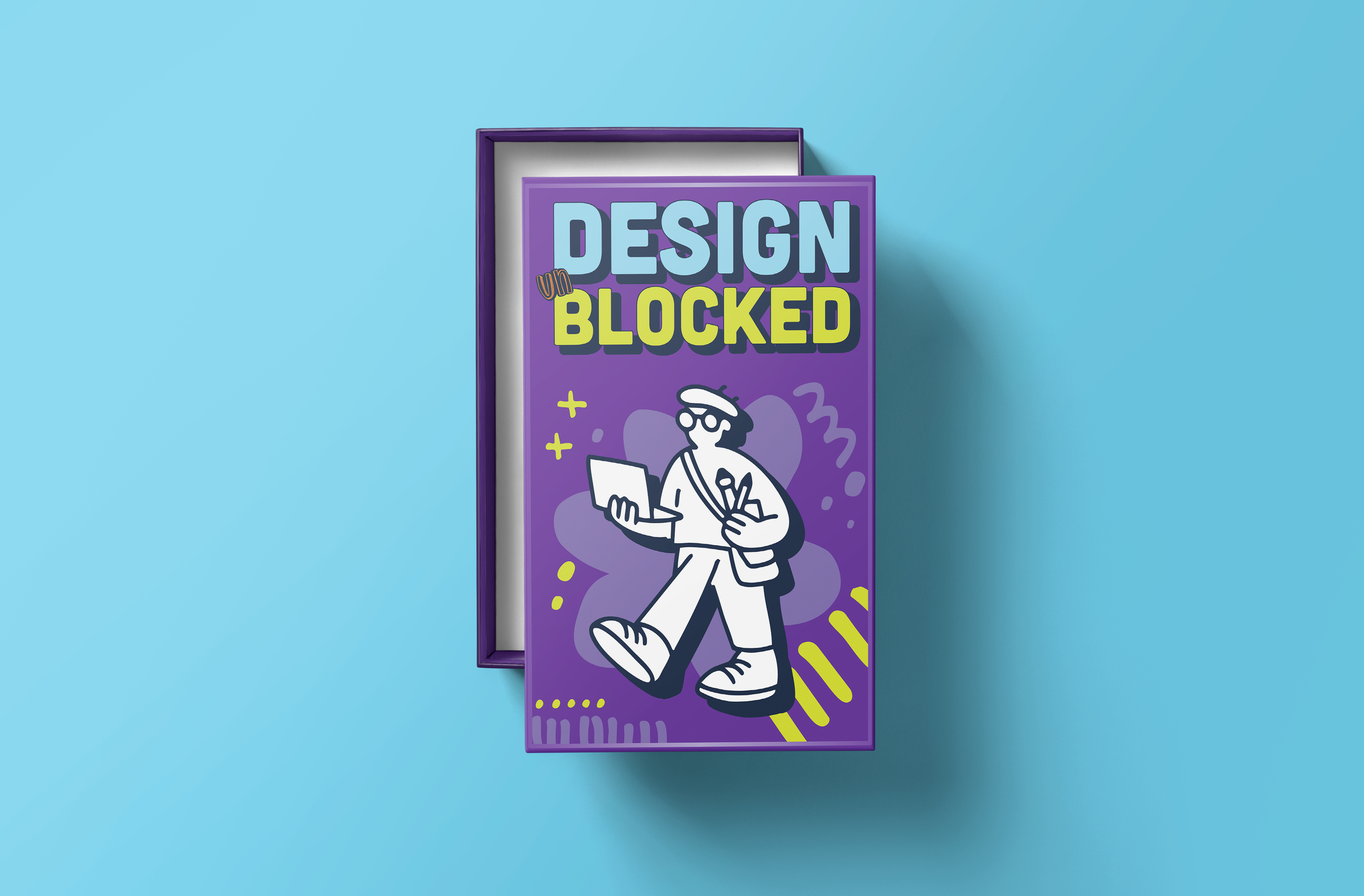 A purple box with a colorful cover featuring an illustrated person with glasses holding a tablet, with text that reads "Design Blocked" on a light purple background, surrounded by decorative doodles.