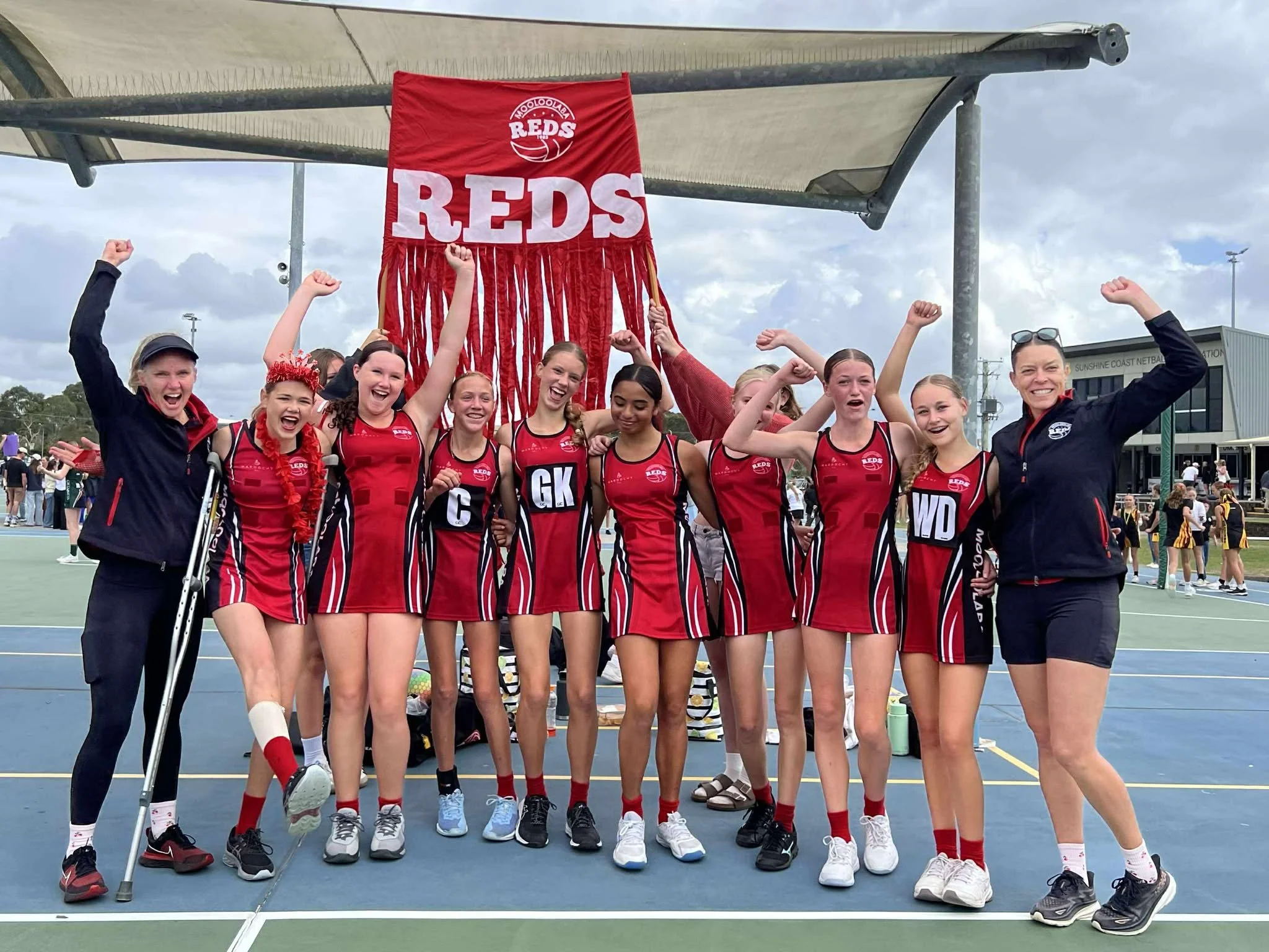 Mooloolaba Reds team and coaches  at Fishermans Road Netball
