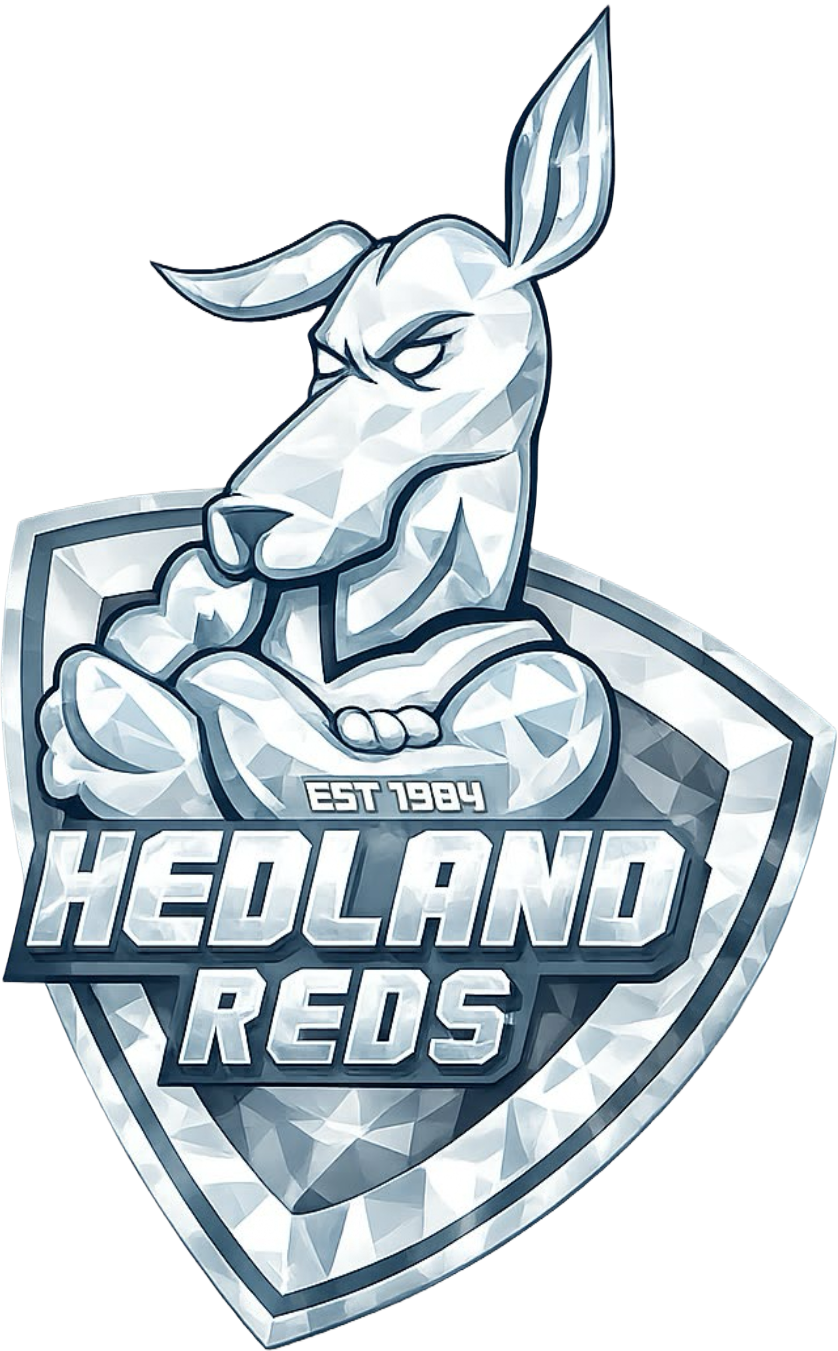 A stylized silver-colored logo featuring an angry-looking kangaroo inside a shield with the words "Heeland Reds" and "Est 1984."